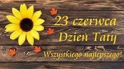 Na zdjęciu znajduje się napis 23 czerwca Dzień Taty. Obok napisu jest kwiatek